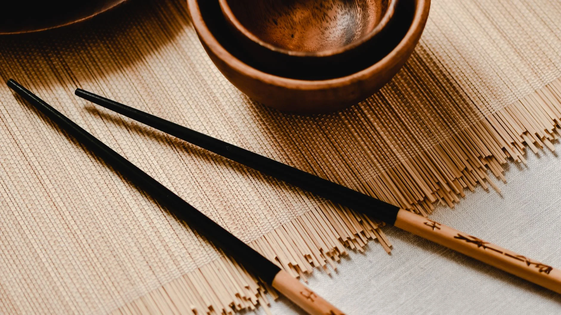 Close-up of a bamboo outdoor dining set showcasing its natural texture and design