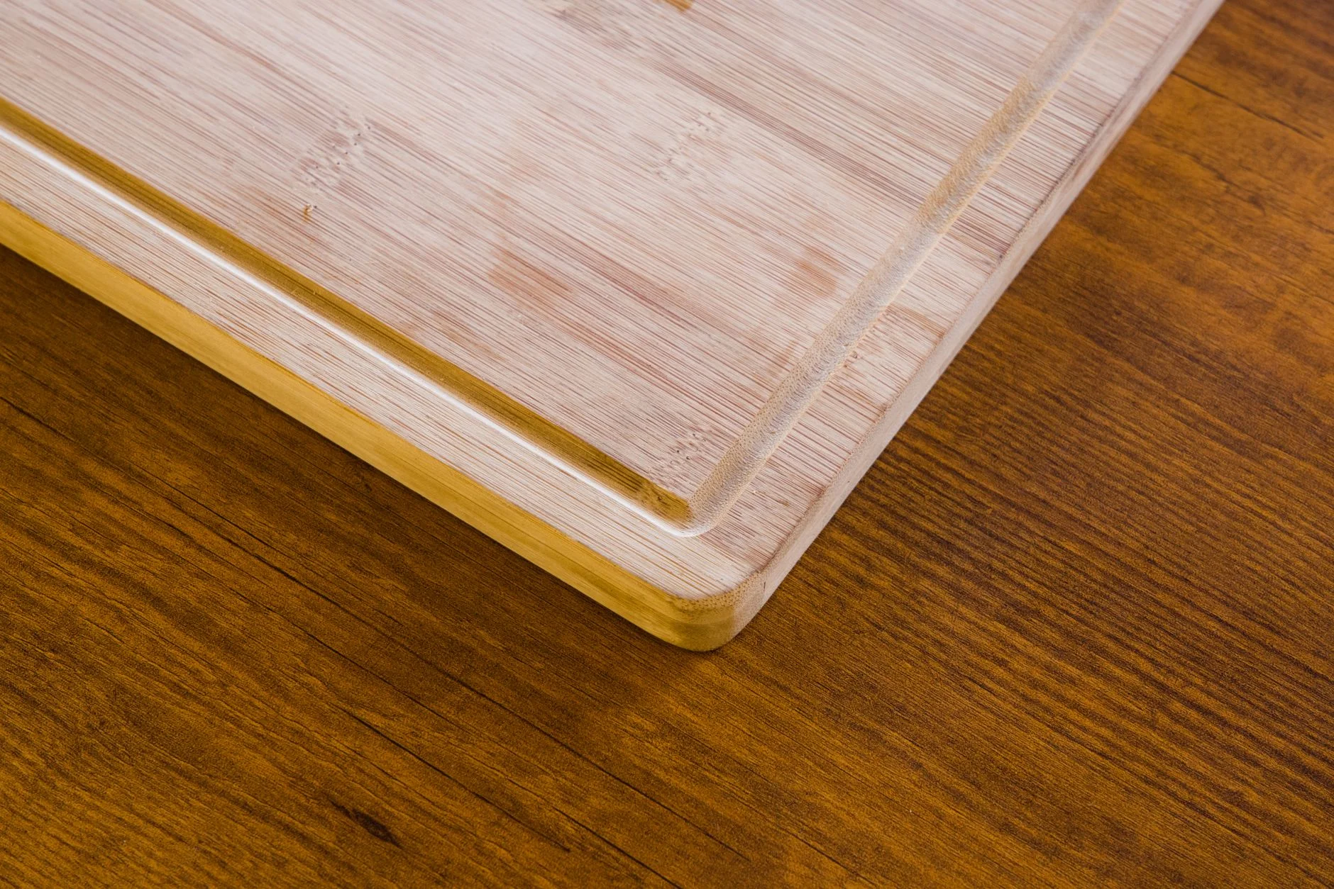 A close-up of a bamboo shelf showing its natural grain and finish